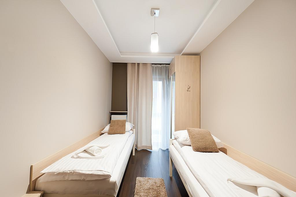 Novum Center Near The Train Station By Sun & Snow Apartmán